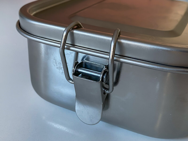 The buckles of a stainless steel container